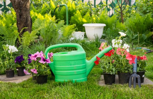 Worker managing garden rubbish removal safely
